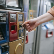 Person inserting card on an automated machine